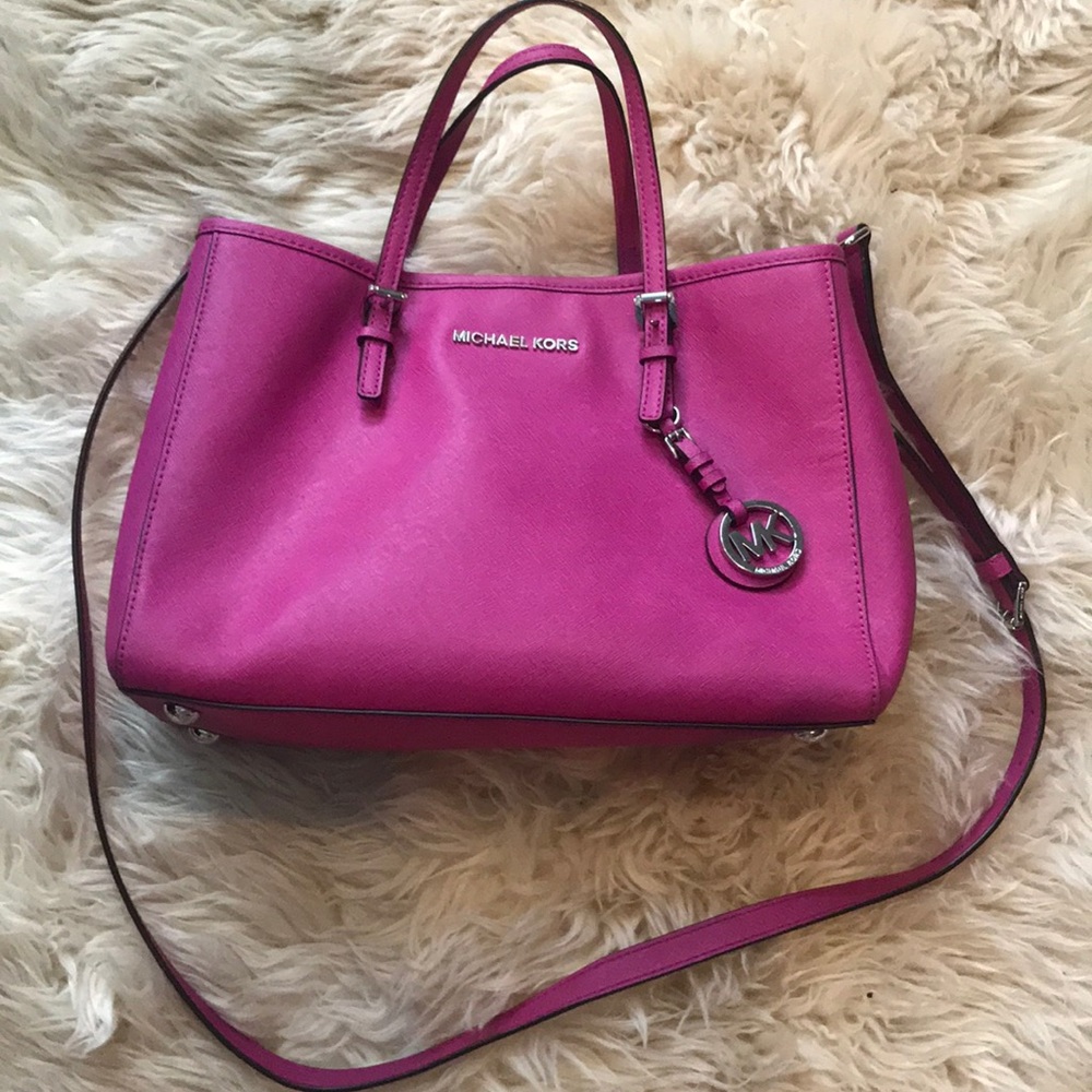 Pink Michael Kors cross body handbag